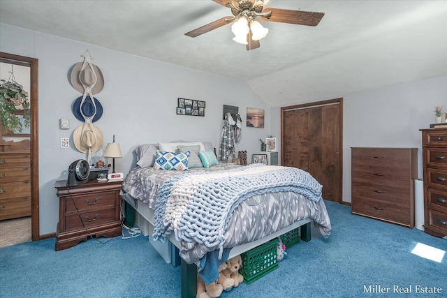 carpeted bedroom with a closet, a ceiling fan, and lofted ceiling