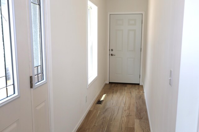 hall featuring light hardwood / wood-style floors