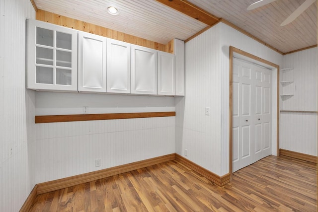 unfurnished room with hardwood / wood-style flooring