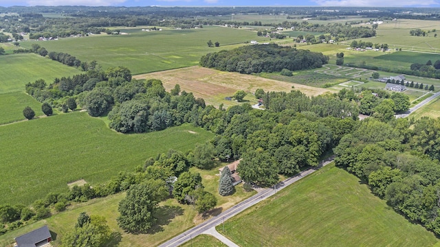 birds eye view of property featuring a rural view