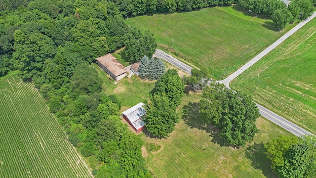 birds eye view of property featuring a rural view