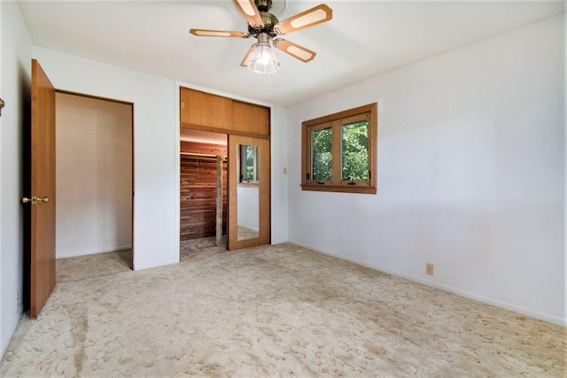 unfurnished bedroom with carpet flooring, ceiling fan, and french doors