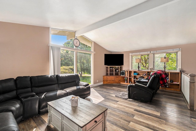 living room featuring dark wood-type flooring and vaulted ceiling with beams