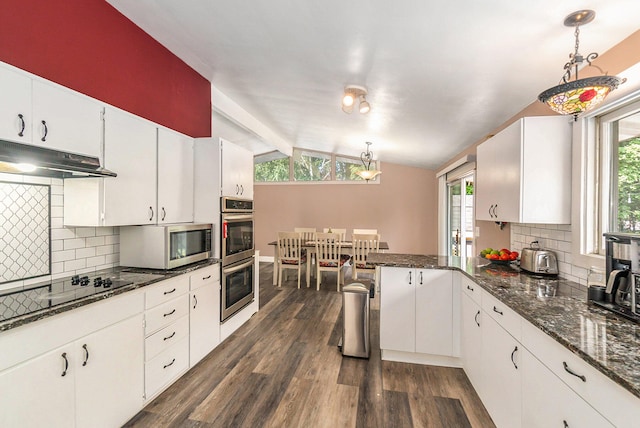 kitchen featuring dark hardwood / wood-style floors, white cabinetry, tasteful backsplash, and vaulted ceiling with beams