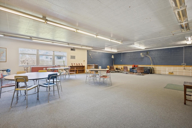 view of carpeted dining space