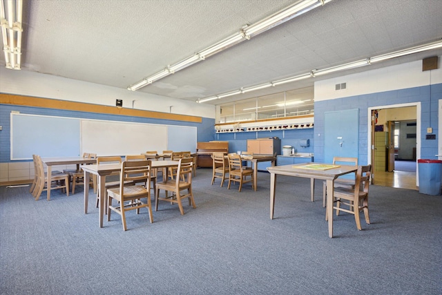 dining area featuring carpet floors