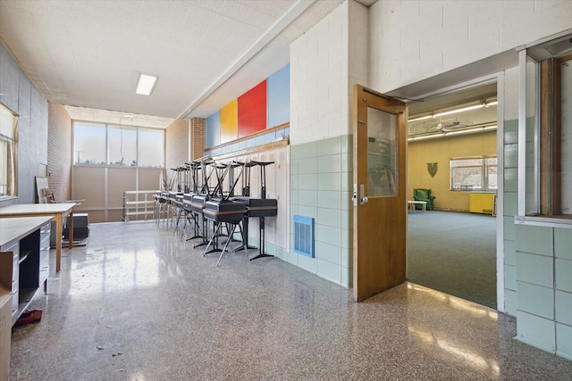 miscellaneous room featuring a textured ceiling