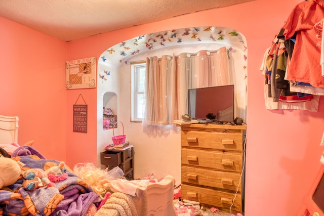 bedroom with a textured ceiling