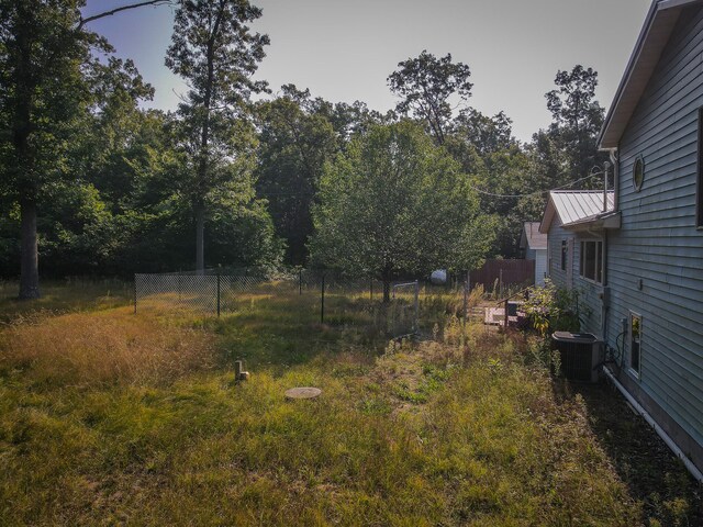 view of yard featuring central AC