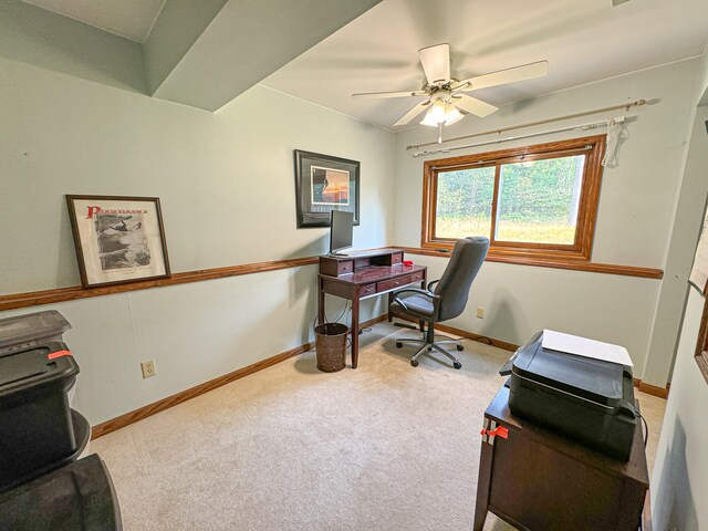 carpeted office with ceiling fan