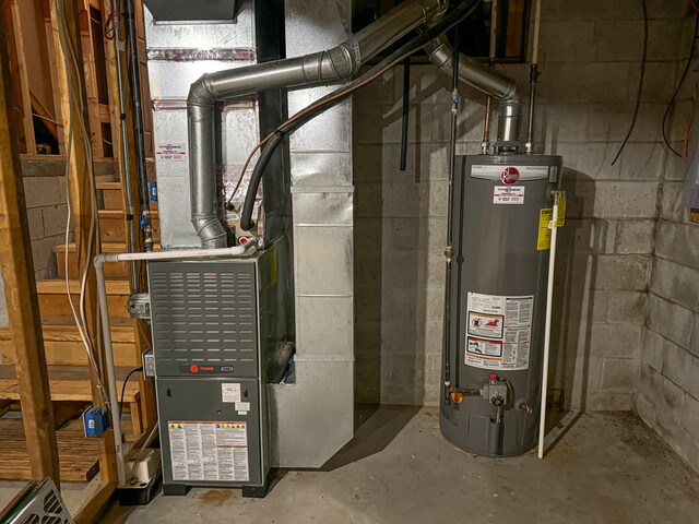 utility room with water heater