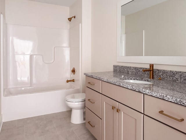 full bath featuring washtub / shower combination, vanity, toilet, and tile patterned floors