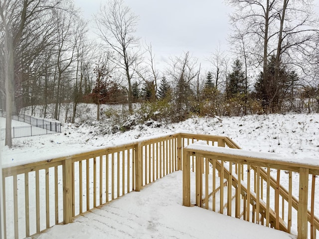 view of snow covered deck