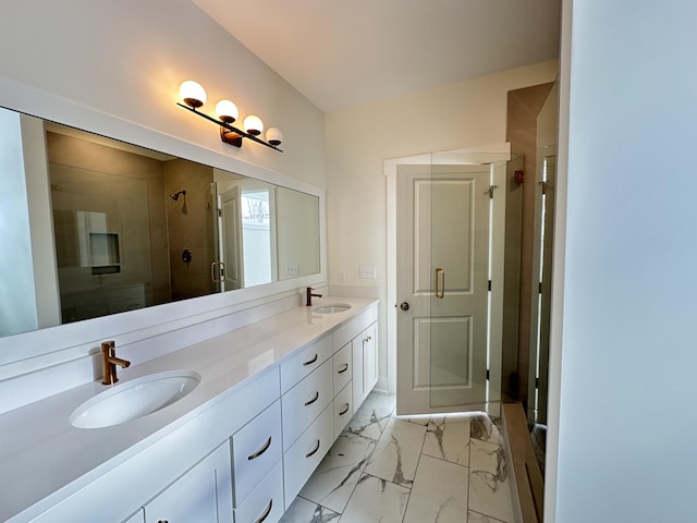 bathroom featuring walk in shower and vanity