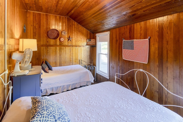 bedroom featuring wood ceiling, wood walls, and vaulted ceiling