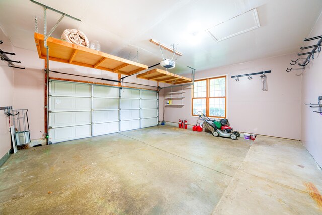 garage featuring a garage door opener