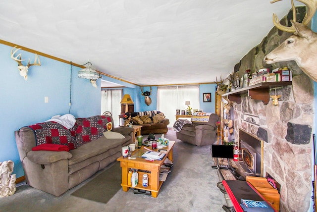 living area featuring a fireplace