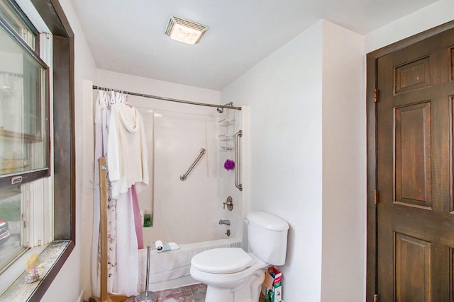 bathroom with visible vents, shower / tub combo with curtain, and toilet