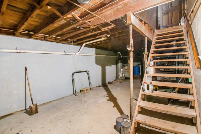 unfinished basement with water heater