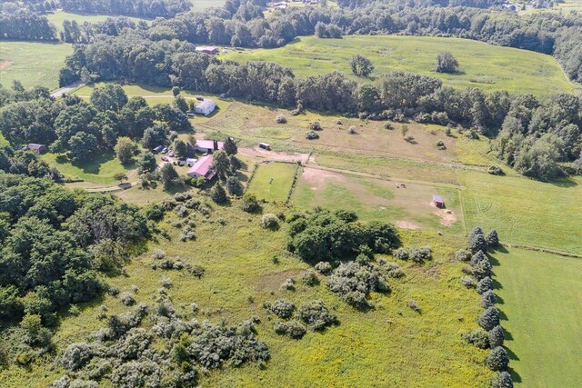 birds eye view of property featuring a rural view