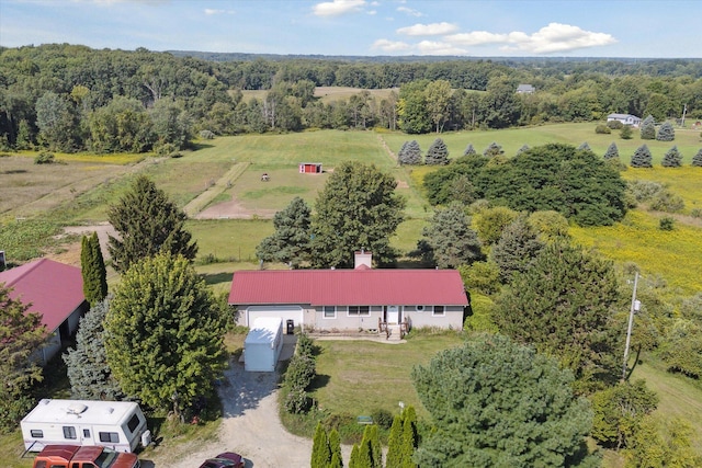 birds eye view of property featuring a rural view