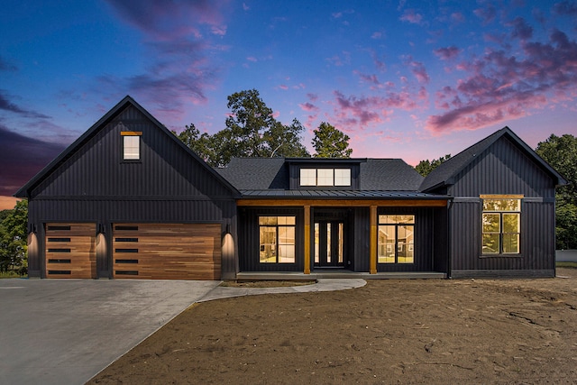 modern farmhouse with a garage