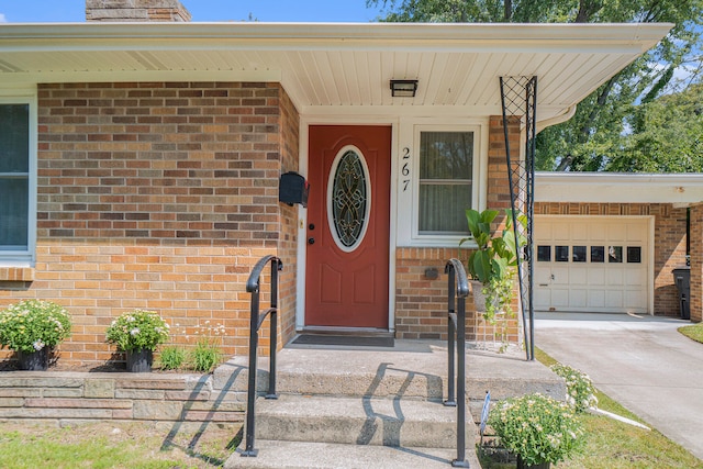 property entrance with a garage