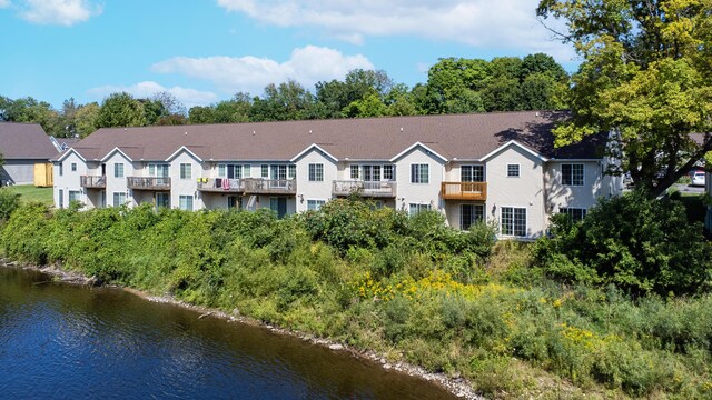 exterior space with a water view