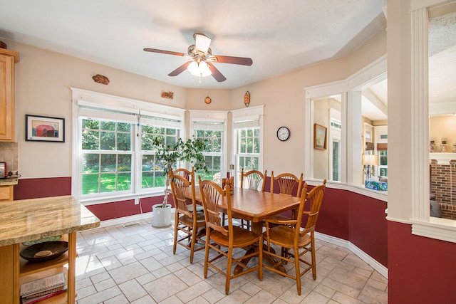 dining area featuring ceiling fan