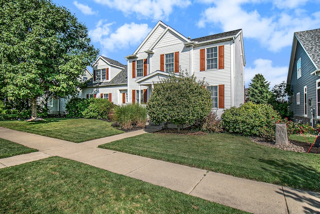 view of front facade with a front lawn