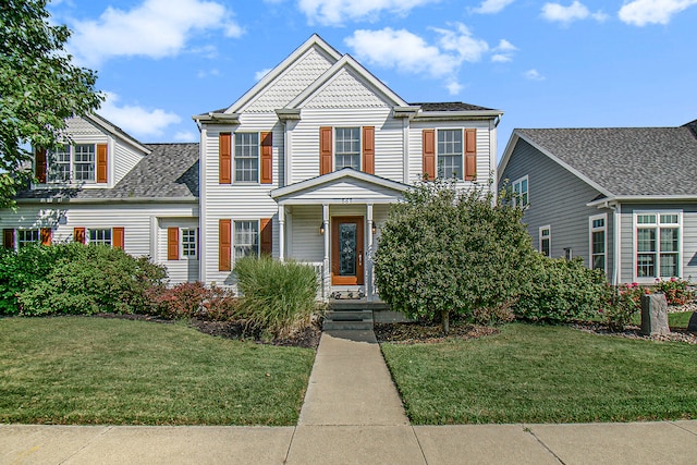 view of front of home featuring a front yard