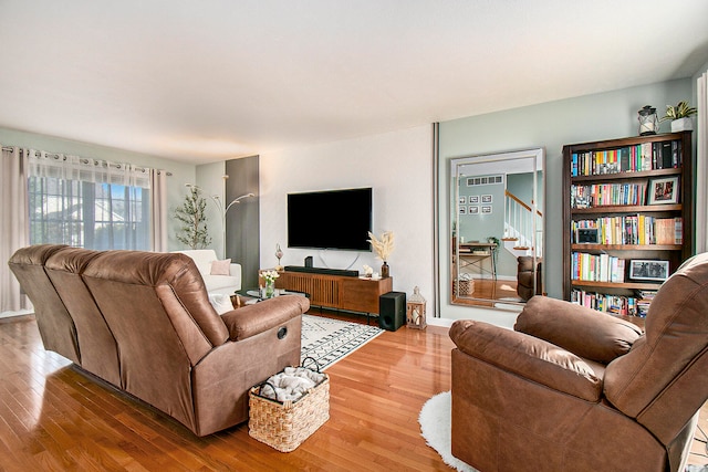 living room with hardwood / wood-style flooring