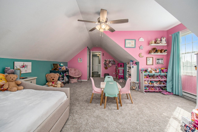 bedroom with light carpet, vaulted ceiling, baseboard heating, and ceiling fan