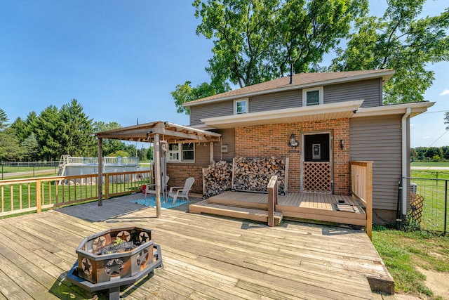 wooden deck with a lawn