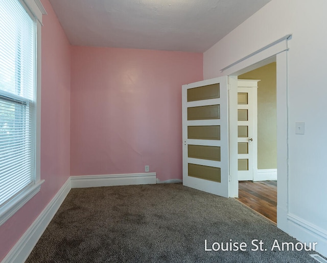 empty room with wood-type flooring