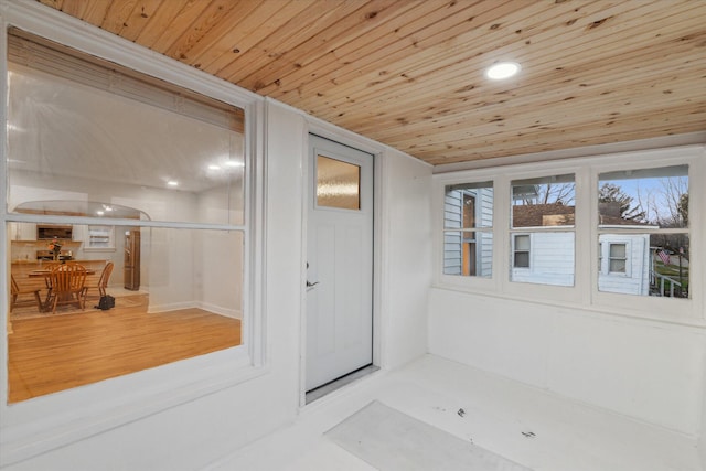 bathroom featuring hardwood / wood-style floors and wood ceiling