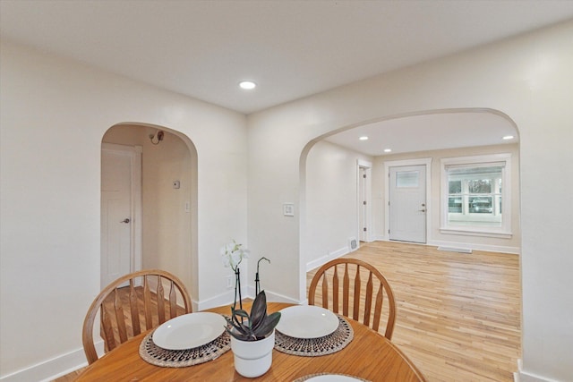 dining area with light wood-type flooring