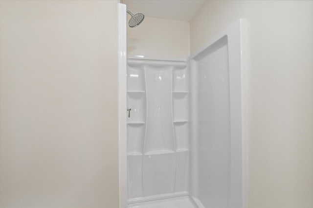 bathroom featuring walk in shower