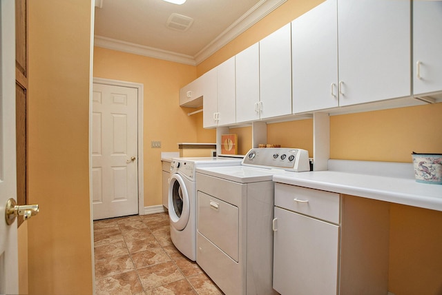 laundry area featuring ornamental molding, cabinet space, visible vents, and separate washer and dryer