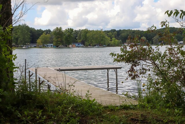 view of dock with a water view