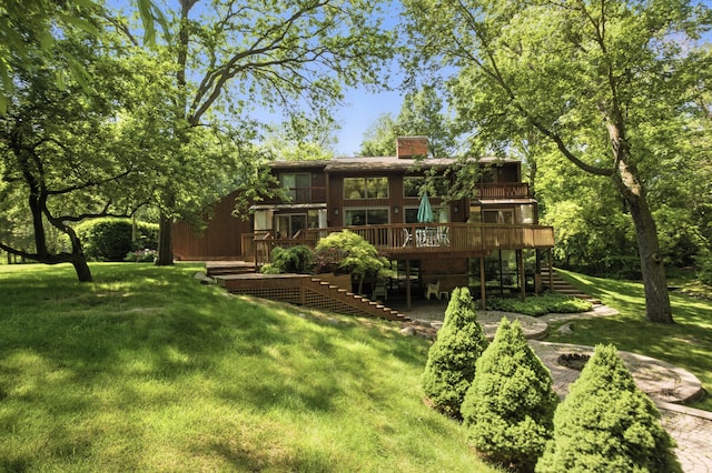 6710 Curtis Rd, Plymouth, MI 48170 - rear view of house with stairs, a deck, a yard, and a chimney