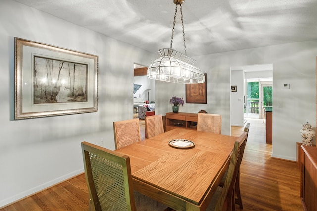 6710 Curtis Rd, Plymouth, MI 48170 - dining area featuring wood finished floors