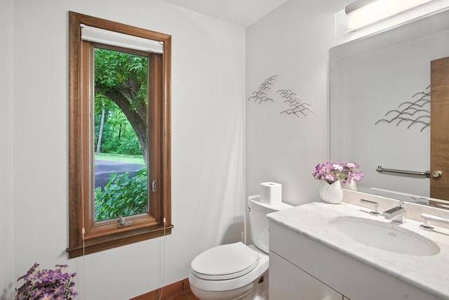 6710 Curtis Rd, Plymouth, MI 48170 - bathroom featuring vanity and toilet