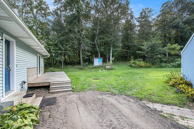 view of yard featuring a deck