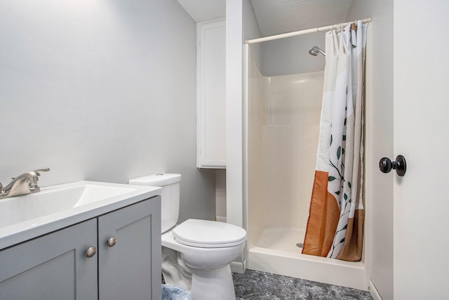 bathroom with tile patterned floors, vanity, walk in shower, and toilet