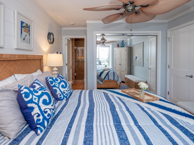 bedroom with ceiling fan, ornamental molding, and a closet