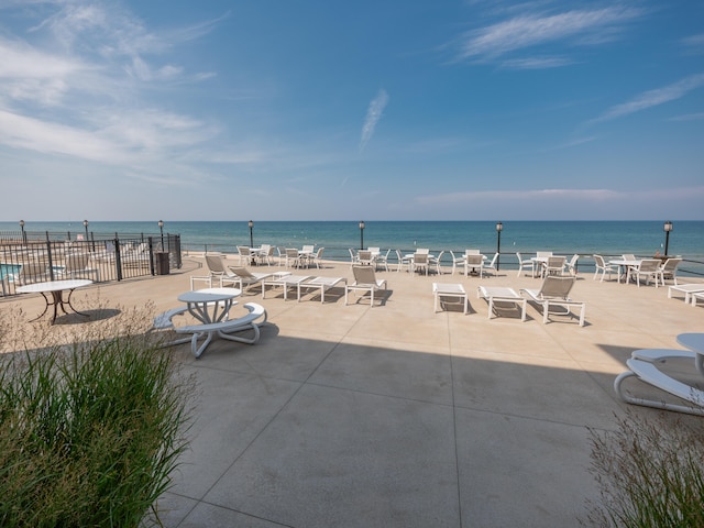 view of patio featuring a water view