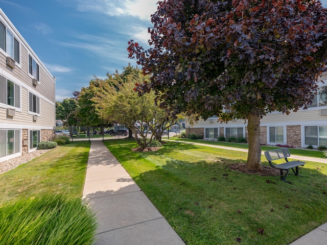 view of community featuring a lawn