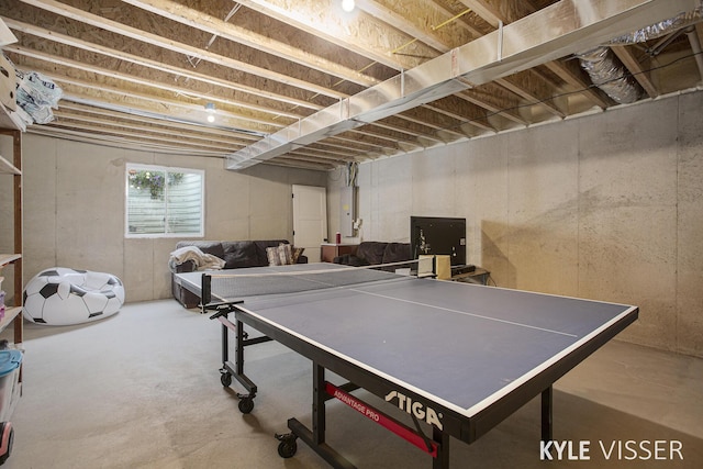 playroom featuring concrete flooring