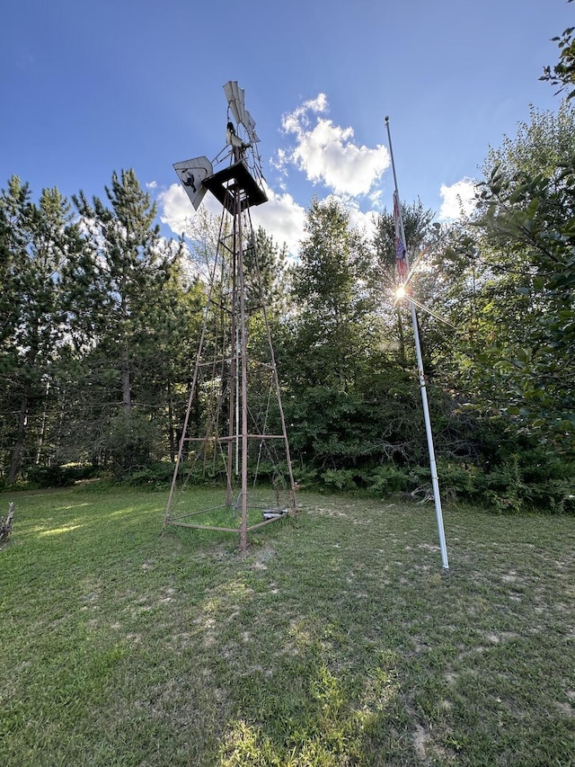 view of playground featuring a lawn